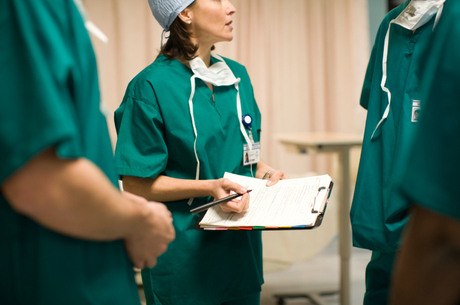 Three surgeons in operating room